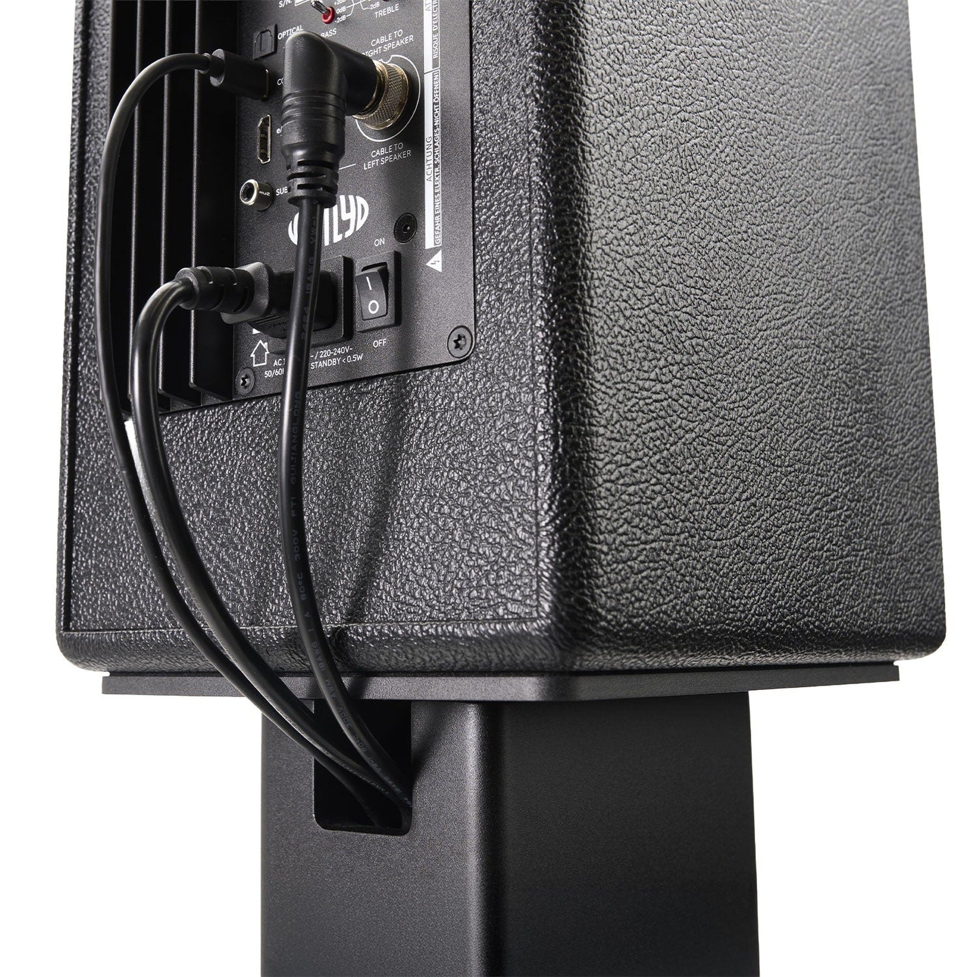 Cable management detail behind a Vestlyd speaker mounted on the M-Stands