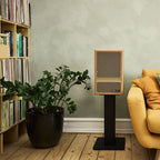 Vestlyd M8C Active in Oak on a floor stand in a bright living room