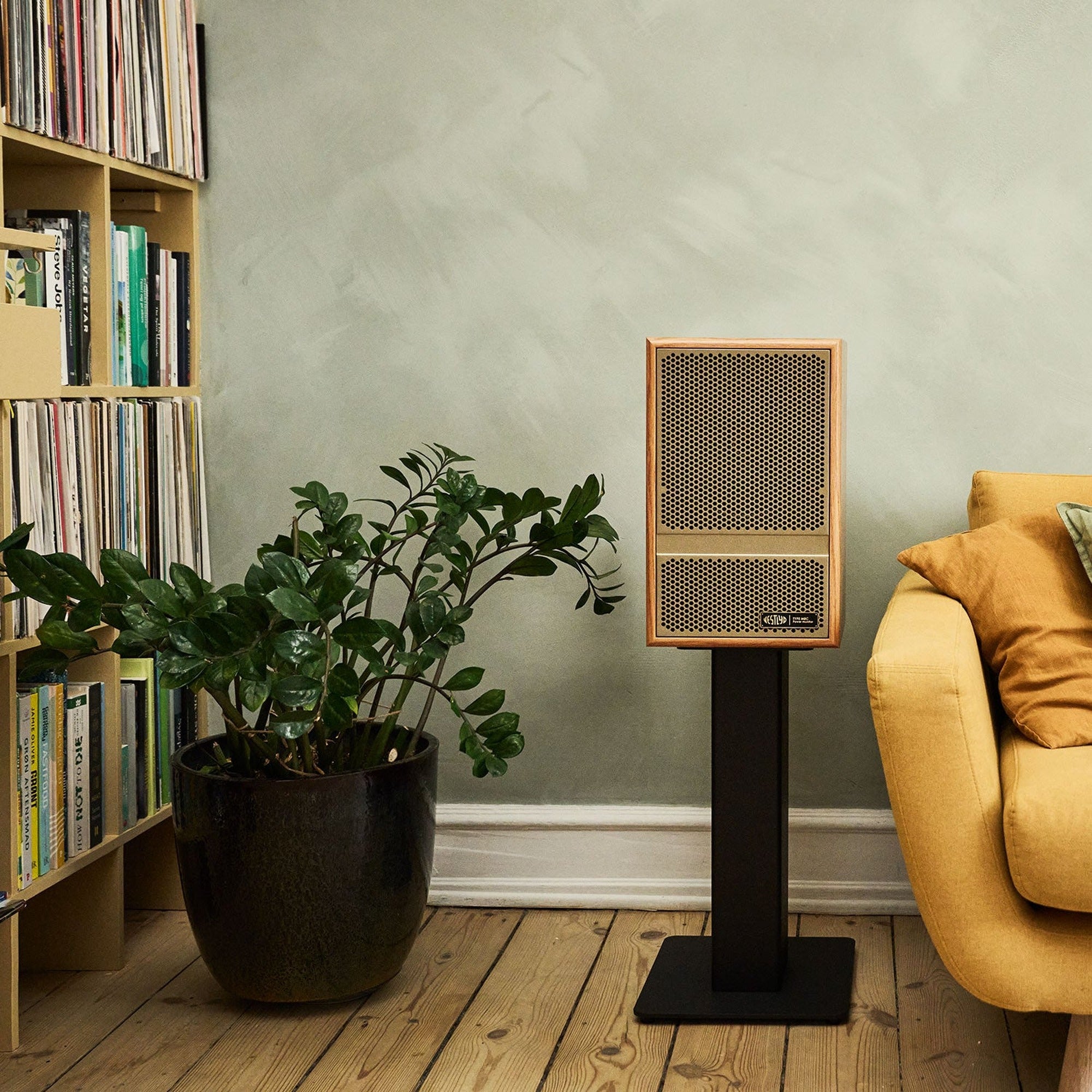 Vestlyd M8C Active in Oak on a floor stand in a bright living room