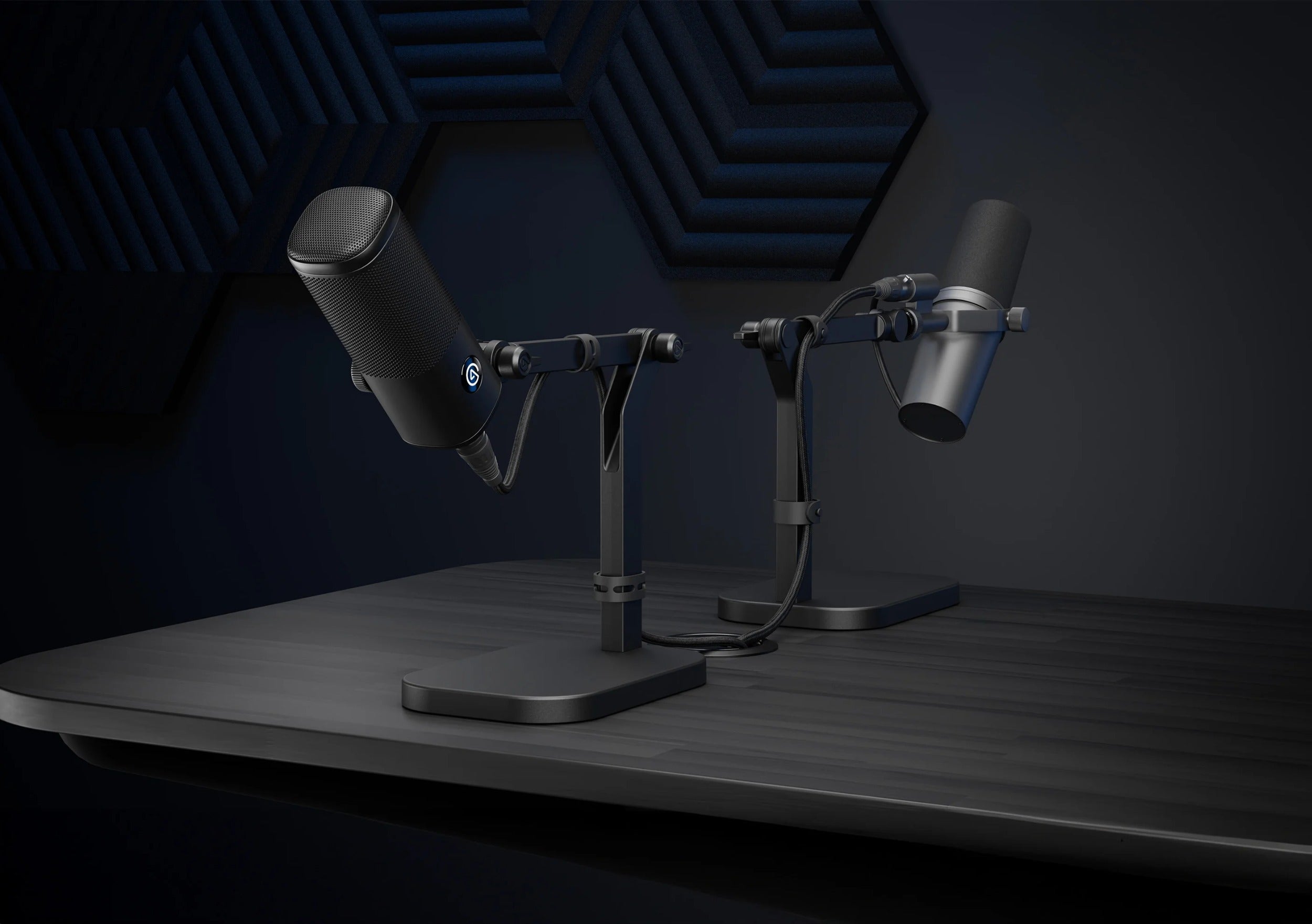 Elgato Wave Desk Stand holding a desktop microphone on a workspace with a computer and accessories.