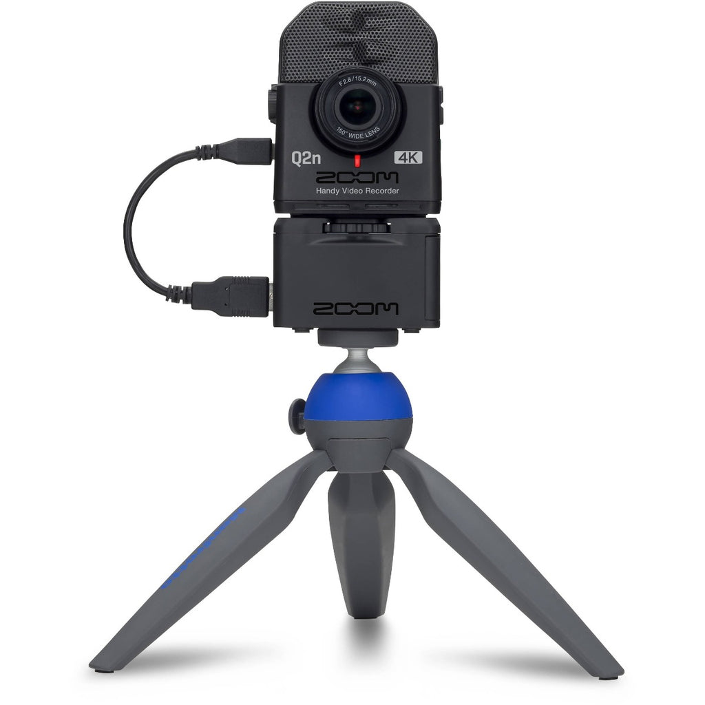 Zoom Q2n-4K video camera with protective case, featuring compact design and lens for high-quality audio and video recording.