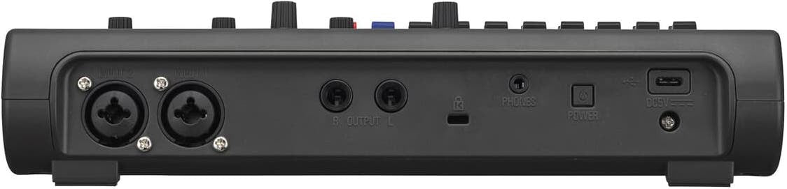 Zoom R12 digital recorder with multiple input ports and large display, ideal for music recording and audio production.
